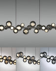 Modern Kinetic chandelier with multiple lights on a gray background showing different colour temperatures