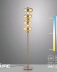 Neuhaus PURE floor lamp with a gray background and color temperature scale.
