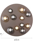 Round ceiling light fixture with multiple bulbs on a white background