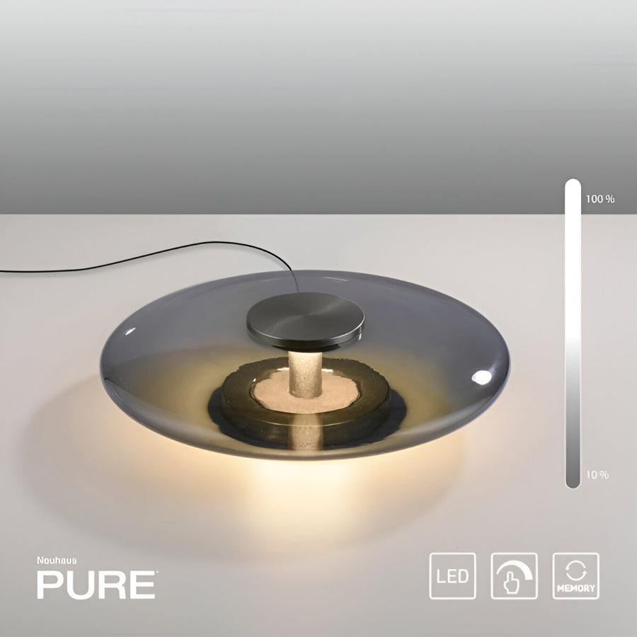 Modern table lamp with 'PURE' branding on a neutral background