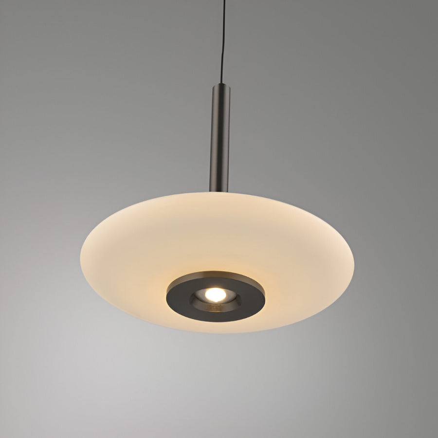 Pendant light with a beige shade and black fixture on a gray background