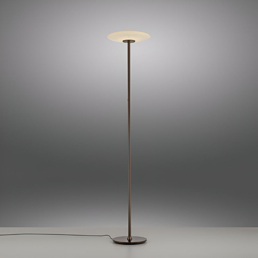 Floor lamp with a white shade on a gray background