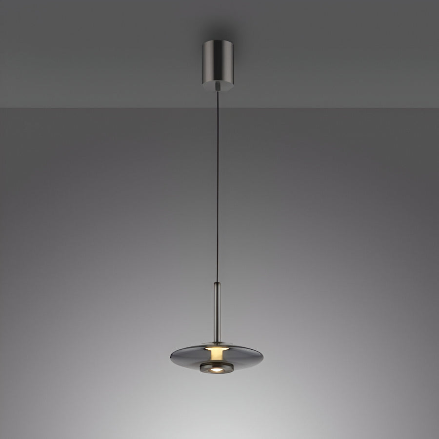 Modern pendant light with a manual comfort lift system on a dark gray background