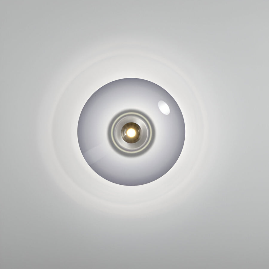 Round ceiling light fixture on a gray background