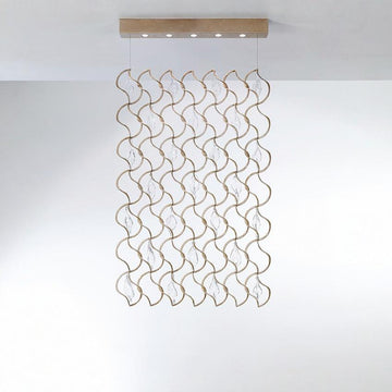 Decorative ceiling light fixture with wavy design on a white background