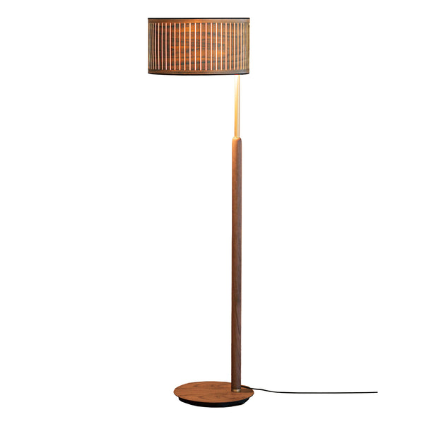 Floor lamp with wooden base and cylindrical brown shade on a white background from Nomon available at Spacio retail stores in Mumbai & Kolkata. 