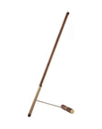 Brass & walnut wood floor lamp on a white background from Nomon available at Spacio retail stores in Mumbai & Kolkata. 