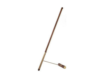 Brass & walnut wood floor lamp on a white background from Nomon available at Spacio retail stores in Mumbai & Kolkata. 