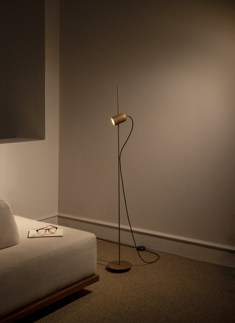 Modern floor lamp in a room with a neutral color palette
