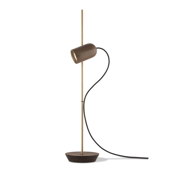 Modern floor lamp with a cylindrical shade on a white background from Nomon available at Spacio retail stores in India. 