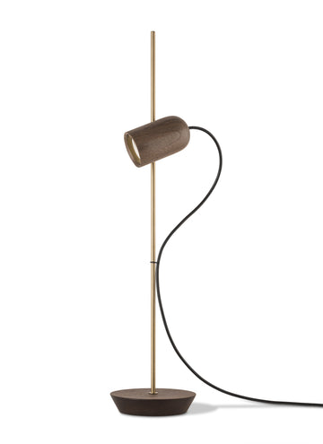 Modern floor lamp with a cylindrical shade on a white background from Nomon available at Spacio retail stores in India. 