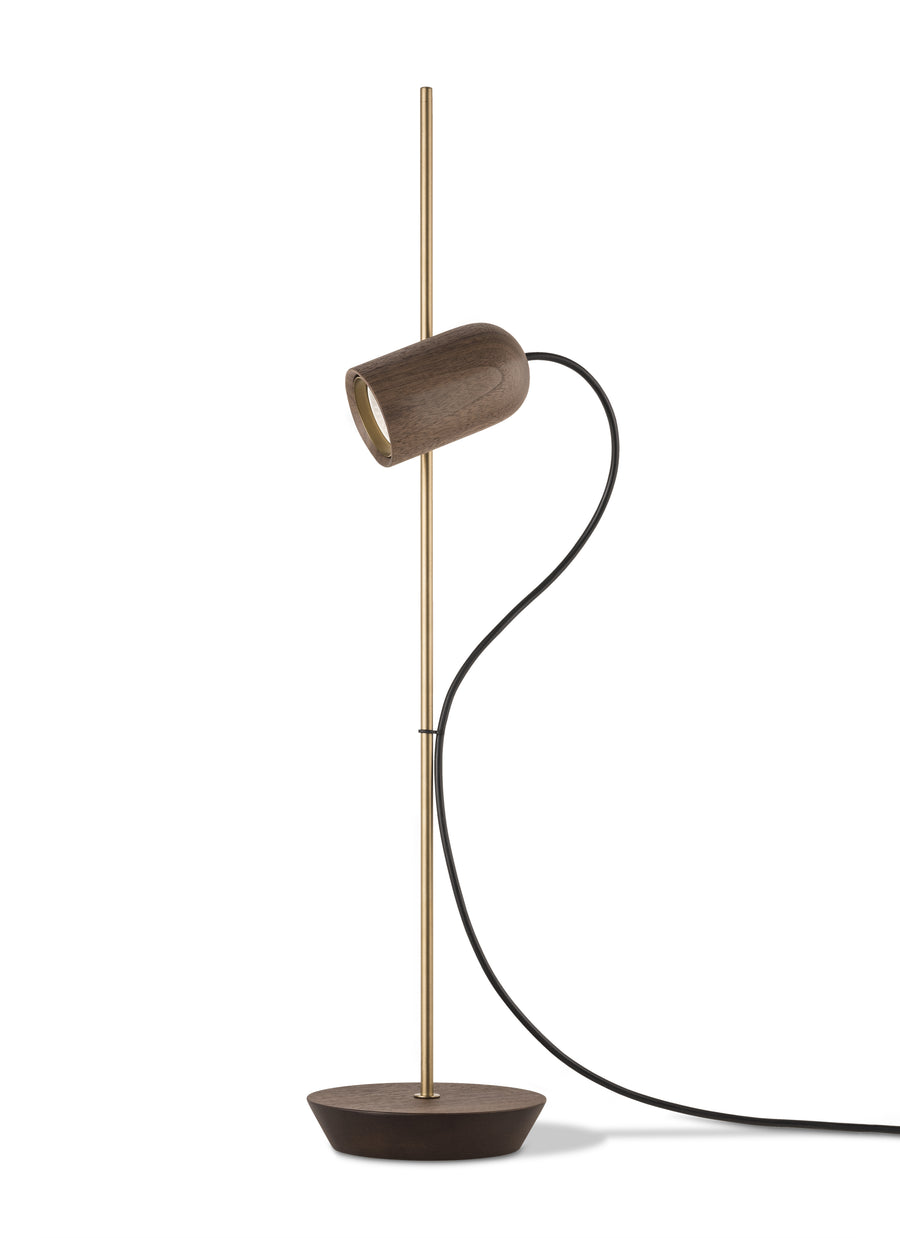 Modern floor lamp with a cylindrical shade on a white background from Nomon available at Spacio retail stores in India. 
