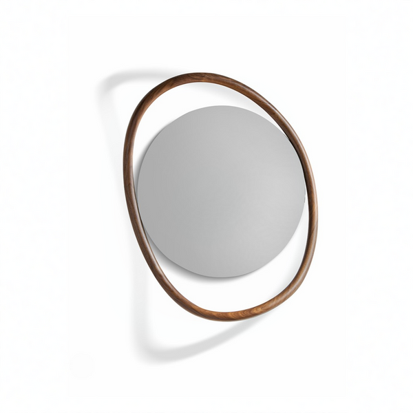 Round mirror with wooden frame on a white background