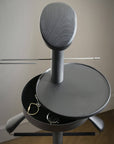Close up of the Ash wood and graphite finish in the coat hanger
