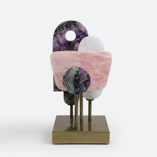 Decorative object with multicolored quartz on a white background