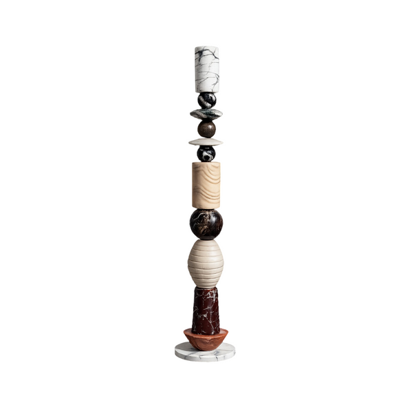 Decorative floor sculptural totem with marble on a white background