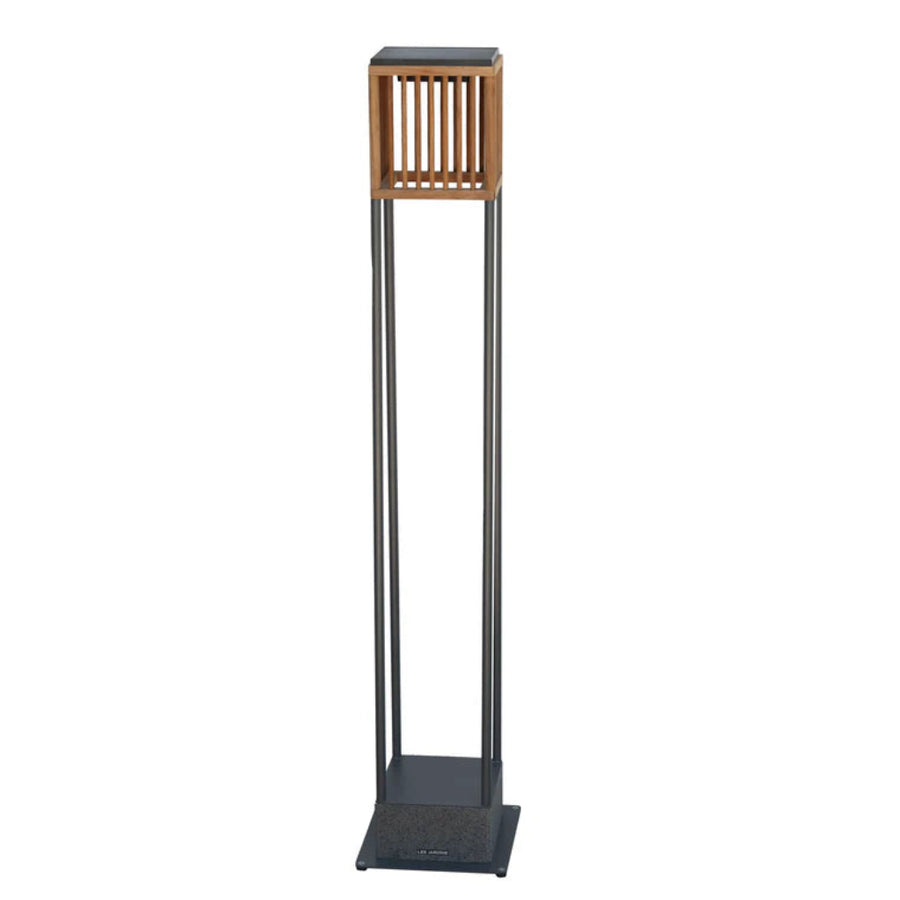 Tall outdoor solar floor lamp with wooden top section on a white back ground by Les Jardins available at Spacio retail stores in Mumbai & Kolkata.  