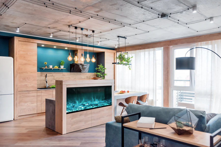 A kitchen with a blue walls and a Planika Fireplace Electric LED Astro Wall Mounted that showcases design flexibility with 3D LED technology.