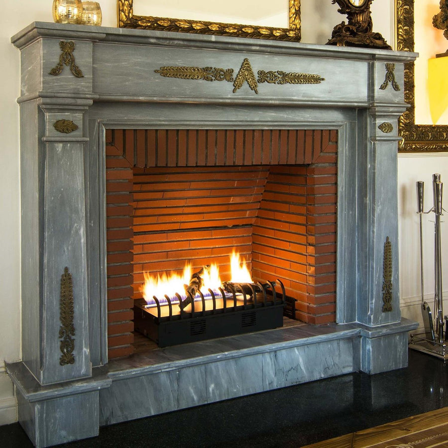 A living room adorned with a Planika Bioethanol Fireplace Hot Box, featuring an elegant framed picture above it.