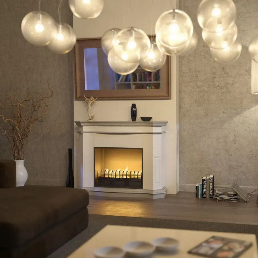 A living room with warm ambiance and a Planika Bioethanol Fireplace Hot Box.