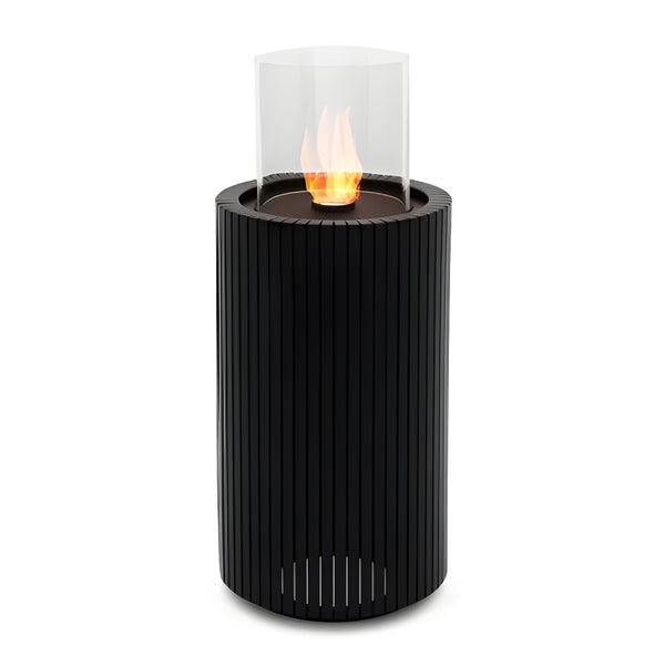 Black cylindrical fire pit called Madala with a glass cover on a white background from Planika  available at Spacio retail stores in Mumbai & Kolkata. 
