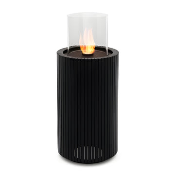 Black cylindrical fire pit called Madala with a glass cover on a white background from Planika  available at Spacio retail stores in Mumbai & Kolkata. 