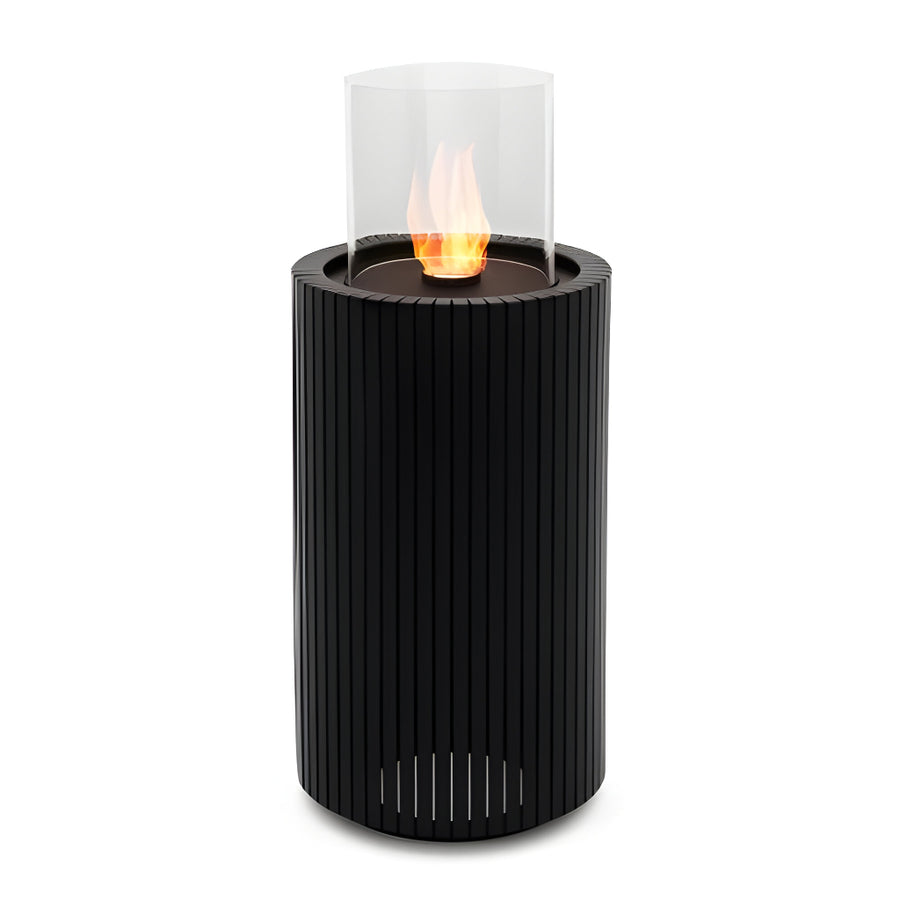 Black cylindrical fire pit called Madala with a glass cover on a white background from Planika  available at Spacio retail stores in Mumbai & Kolkata. 