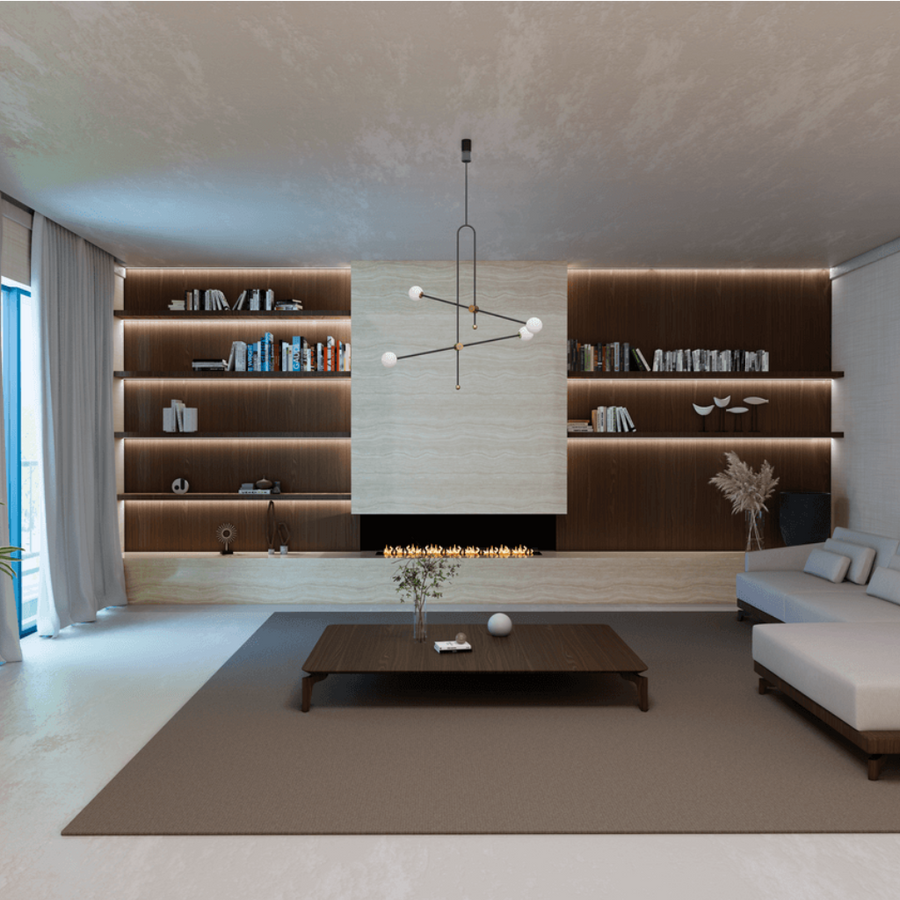 Modern living room with bookshelves, a coffee table, and a sofa.