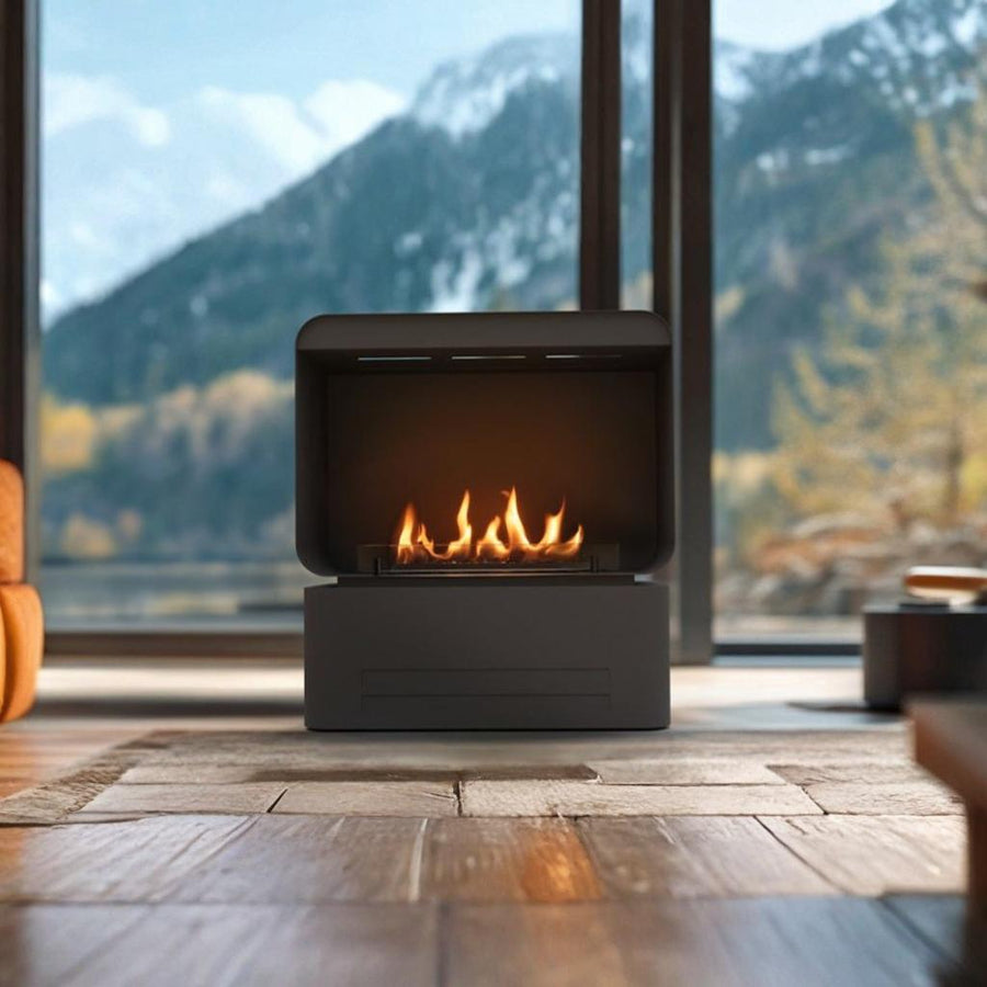 Modern bioethanol fireplace with a mountain view in the background