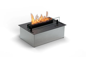 Planika's bioethanol insert fireplace with flames on a white background available at Spacio retail stores in Mumbai & Kolkata