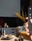 Remote-controlled Planika Cool Flame Pro water vapour fireplace in a contemporary setting. Smart home compatible, available at Spacio India.