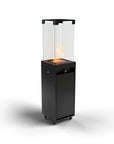 Black outdoor gas fireplace with glass cover on a white background from Planika available at Spacio retail stores in Mumbai & Kolkata. 