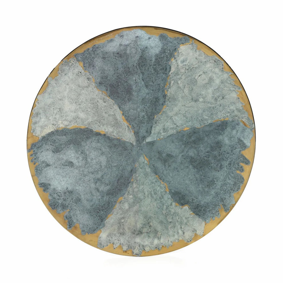 Round glass art with a natural stone pattern on a white background
