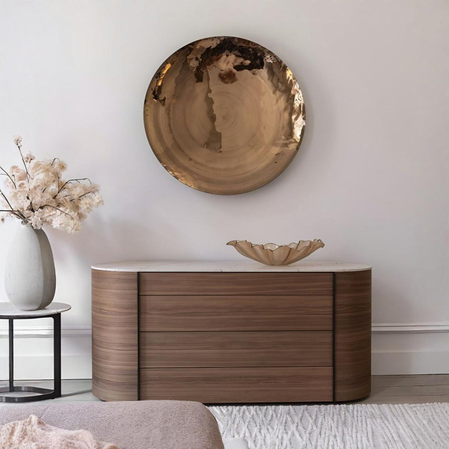 Wooden sideboard with decorative bowl and glass wall art by Gardeco available at Spacio retail stores in Mumbai & Kolkata.  