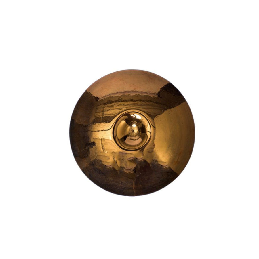 Round brass finish glass wall sculpture on a white background by Gardeco available at Spacio retail stores in Mumbai & Kolkata.  