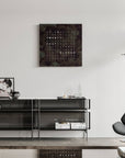 Qlocktwo Earth 90 Creator's Edition Raw Iron Limited Edition Clock on wall above modern console with decor accessories & furniture available at Spacio India for luxury home decor collection of Timepieces & Clocks.