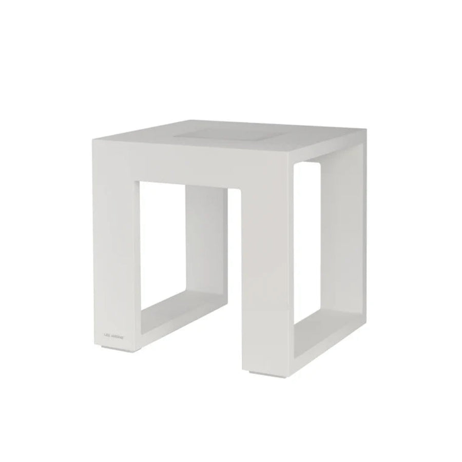 White solar light side table on a white background