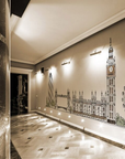 Watercolour sketch of London's skyline featuring Big Ben, Tower Bridge, The Gherkin, and the London Eye, handcrafted on an Italian fresco mural.. Featured in the entrance foyer of luxury mumbai high rise apartment styled by navin kanodia interior stylist of spacio mumbai