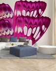 A vivid fresco mural showcasing magenta and white butterfly wings, crafted with Italian plaster using Carrara marble and travertine for a luxurious finish. Featured on a double height living room wall