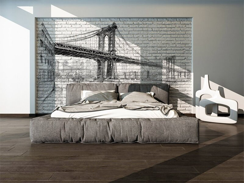 A hand-sketched fresco mural of the Manhattan Bridge in New York, crafted on Italian plaster with Carrara marble and Roman travertine for a luxury finish. Featured on a modern bedroom wall