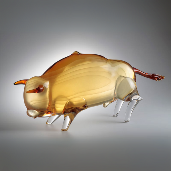 Murano Glass sculpture of a bull on a gray background by Zanetti available at Spacio in India. 