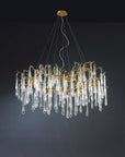 A Serip Aqua Chandelier with clear crystal drops inspired by nature, hanging from the ceiling.