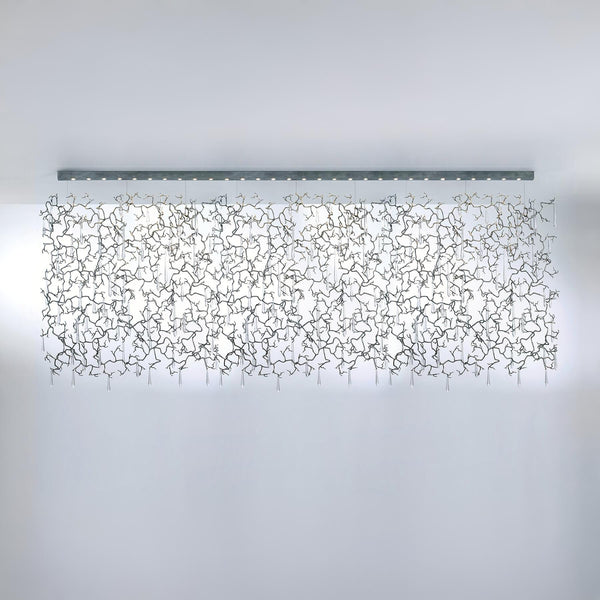 Modern screen light curtain fixture with intricate design on a plain background from Serip