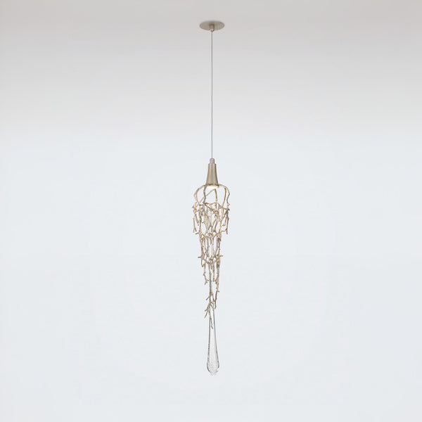 Pendant light fixture hanging against a plain background