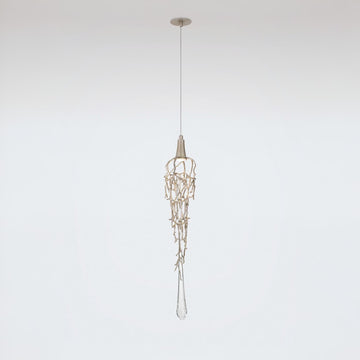 Pendant light fixture hanging against a plain background