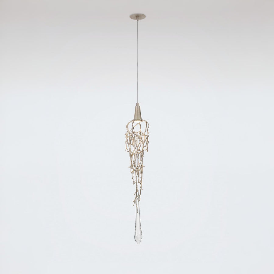 Pendant light fixture hanging against a plain background
