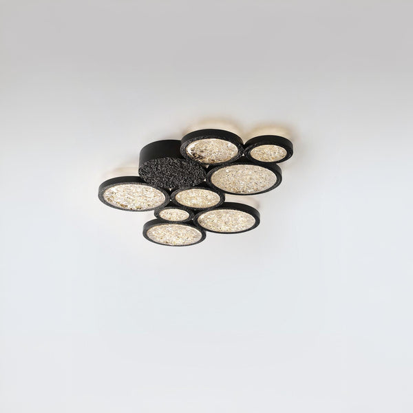 Modern ceiling light fixture with multiple round lights on a white background