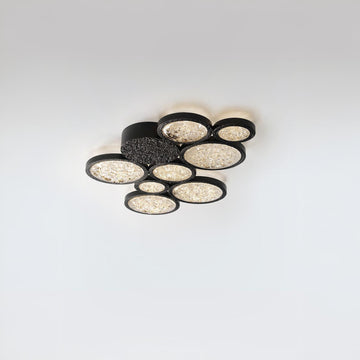 Modern ceiling light fixture with multiple round lights on a white background