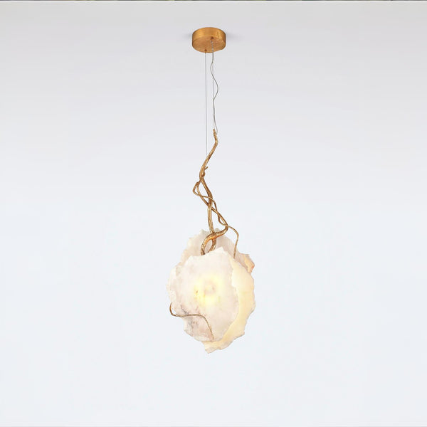 Modern pendant light with a white mabrle and gold metal fixture on a white background