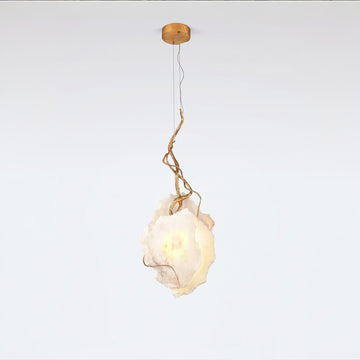 Modern pendant light with a white mabrle and gold metal fixture on a white background
